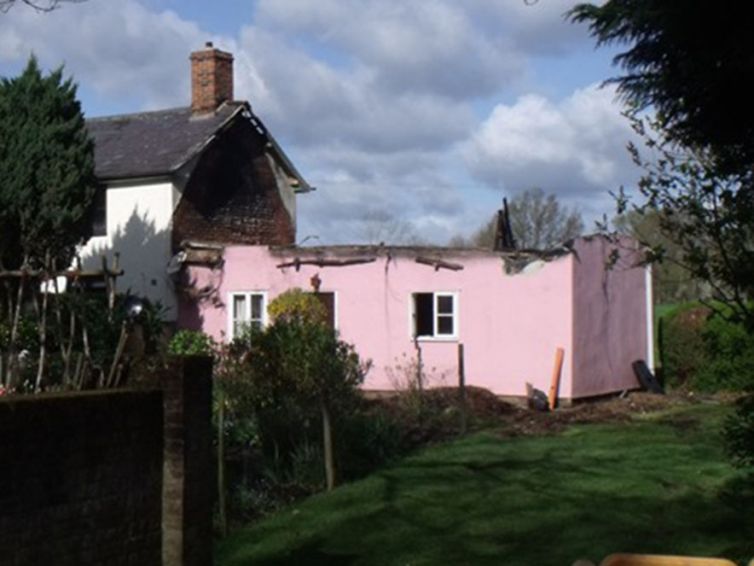 Rebuilt rural cottage, following fire damage - Suffolk